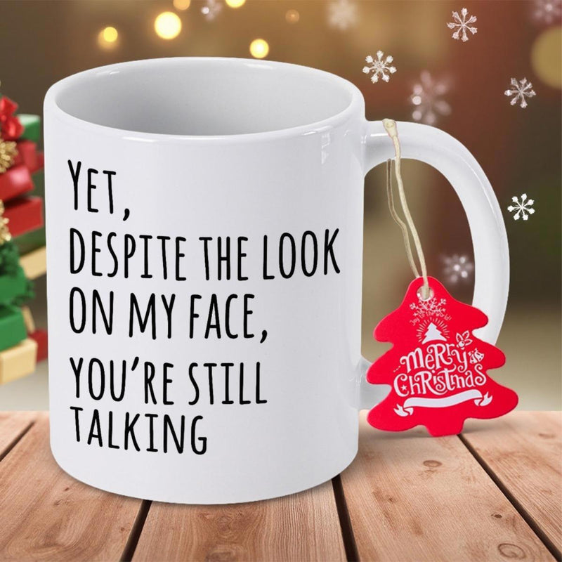Tailorly White Ceramic 11 oz Mug - Yet Despite The Look On My Face Youre Still Talking Minimalist White Ceramic Vessel With Bold Black Text Typography Humorous Mug