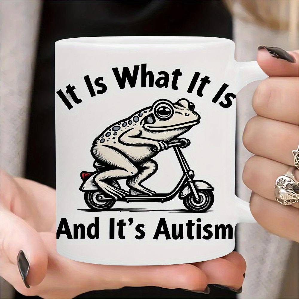 Tailorly White Ceramic 11 oz Mug - It Is What It Is And It's Autism Simple Line Art Style Drawing Of A Commuting Scooter Riding Frog