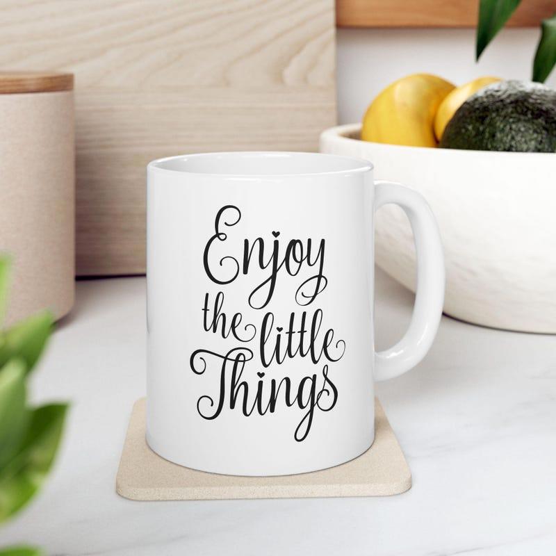 Tailorly White Ceramic 11 oz Mug - Enjoy The Little Things White Ceramic Material With Elegant Cursive Lettering Printed On Smooth Surface Mug