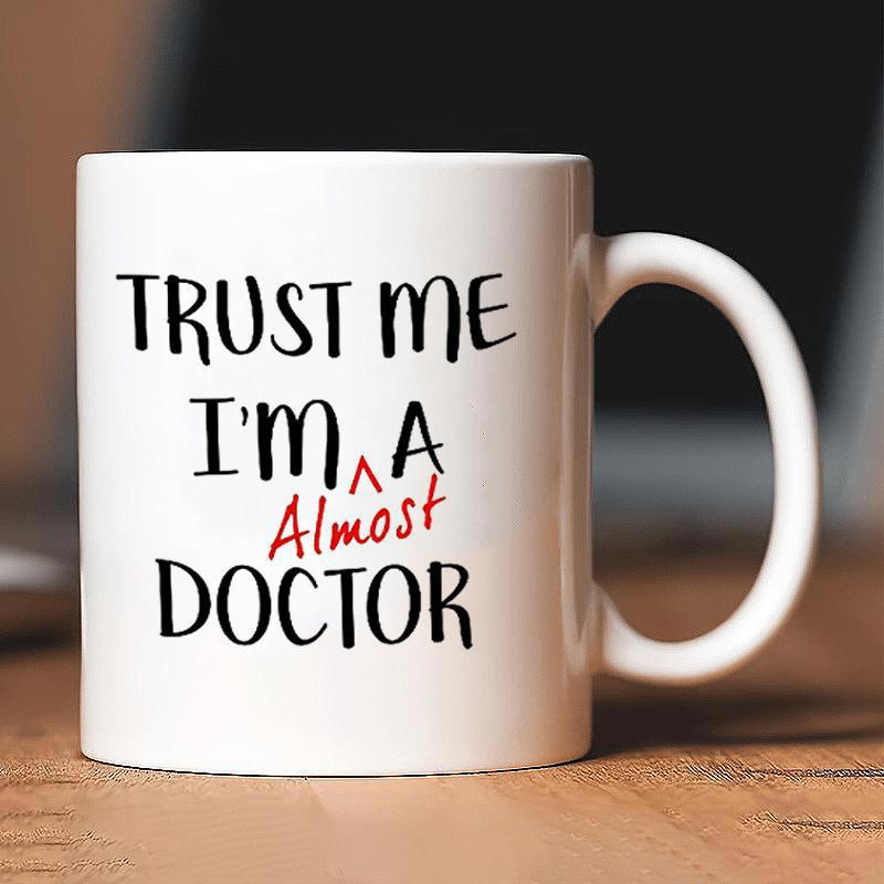 Tailorly White Ceramic 11 oz Mug - Trust Me Im An Almost Doctor Minimalist White Ceramic With Bold Typography And Red Accent Mug