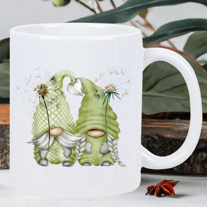 Tailorly White Ceramic 11 oz Mug - Gentle Green Garden Gnomes Holding Dandelions Under Floating Seeds Spring Gnome