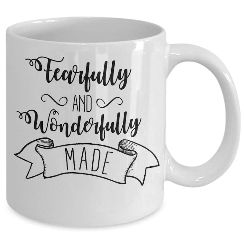Tailorly White Ceramic 11 oz Mug - Fearfully And Wonderfully Made Decorative Artistic Lettering Set Within A Classic Banner Scroll Design Mug