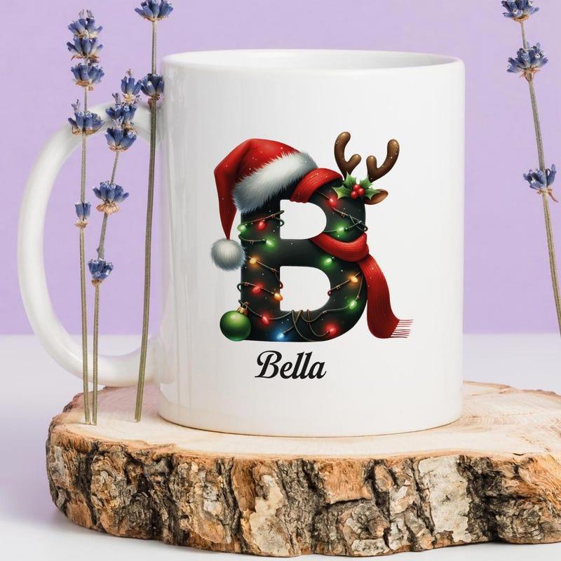 Tailorly White Ceramic 11 oz Mug - Bella Festive Wreath Letter B Decorated With Santa Hat And Reindeer Antlers Mug