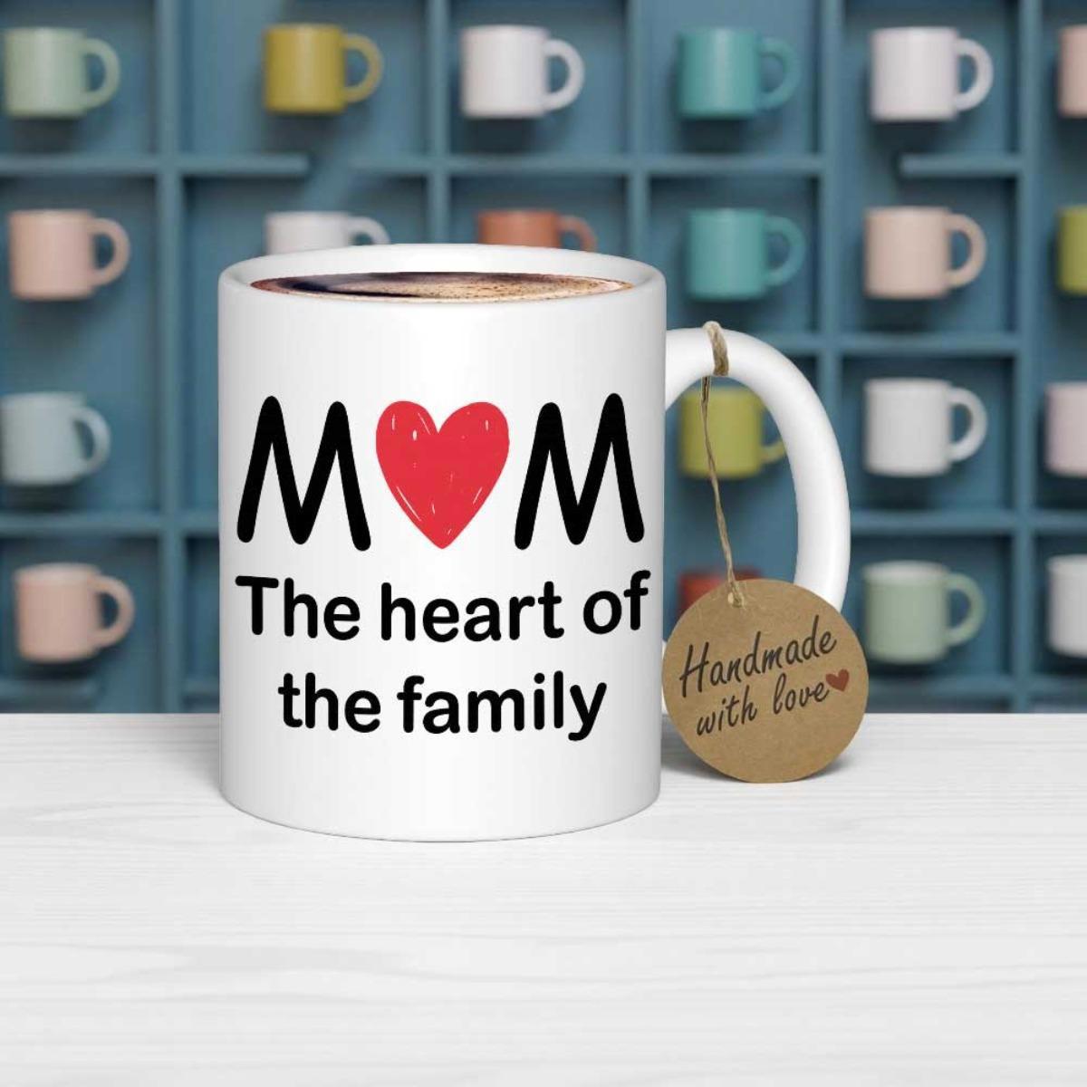 Tailorly White Ceramic 11 oz Mug - Mom The Heart Of The Family Red Heart Symbol Placed Between Bold Black Letters On
