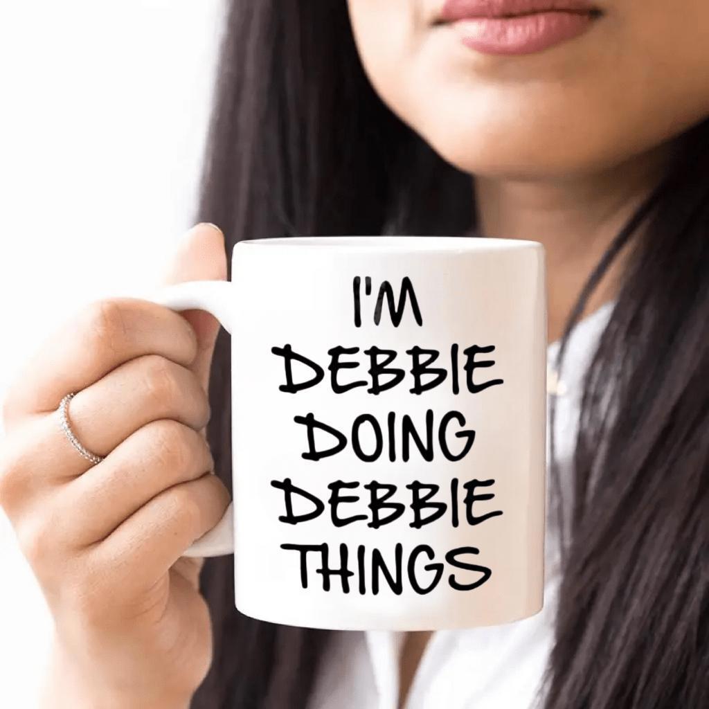 Tailorly White Ceramic 11 oz Mug - Im Debbie Doing Debbie Things Simple White Background With Bold Black Hand Drawn Script Characters Mug