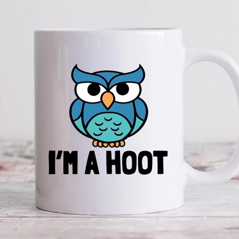 Tailorly White Ceramic 11 oz Mug - Im A Hoot Chubby Blue Cartoon Bird With Large Eyes Sitting Above Playful Text Owl