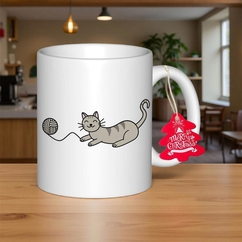 Tailorly White Ceramic 11 oz Mug - Merry Christmas Playful Grey Striped Feline Reaching For A Round Ball Of Yarn Cat