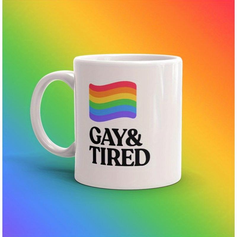 Tailorly White Ceramic 11 oz Mug - Gay Tired Wavy Colorful Rainbow Pride Flag Floating Above Bold Black Artistic Lettering Mug