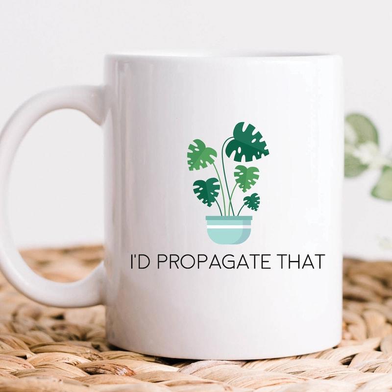Tailorly White Ceramic 11 oz Mug - Id Propagate That Minimalist Green Monstera Leaves Within Light Blue Pot Plant