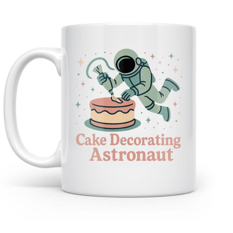 Tailorly White Ceramic 11 oz Mug - Cake Decorating Astronaut Whimsical Space Explorer Decorating Sweet Layered Cake With Stars Astronaut