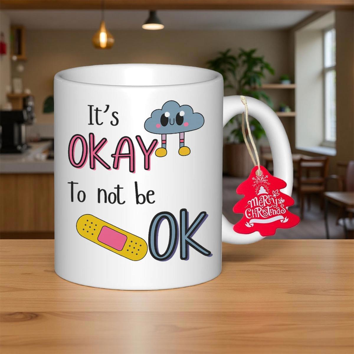 Tailorly White Ceramic 11 oz Mug - Its Okay To Not Be OK Small Gray Cloud Wearing Yellow Boots Beside A Colorful Medical Bandage Mug