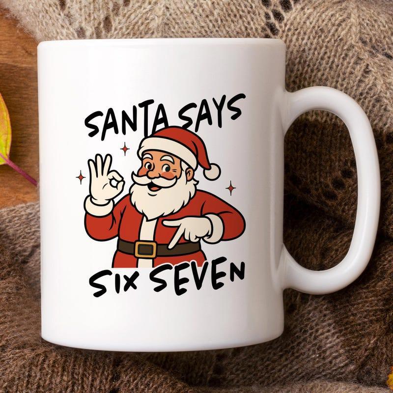 Tailorly White Ceramic 11 oz Mug - Santa Says Six Seven Cheerful Cartoon Figure Gesturing OK Surrounded By Small Decorative Stars Santa Claus