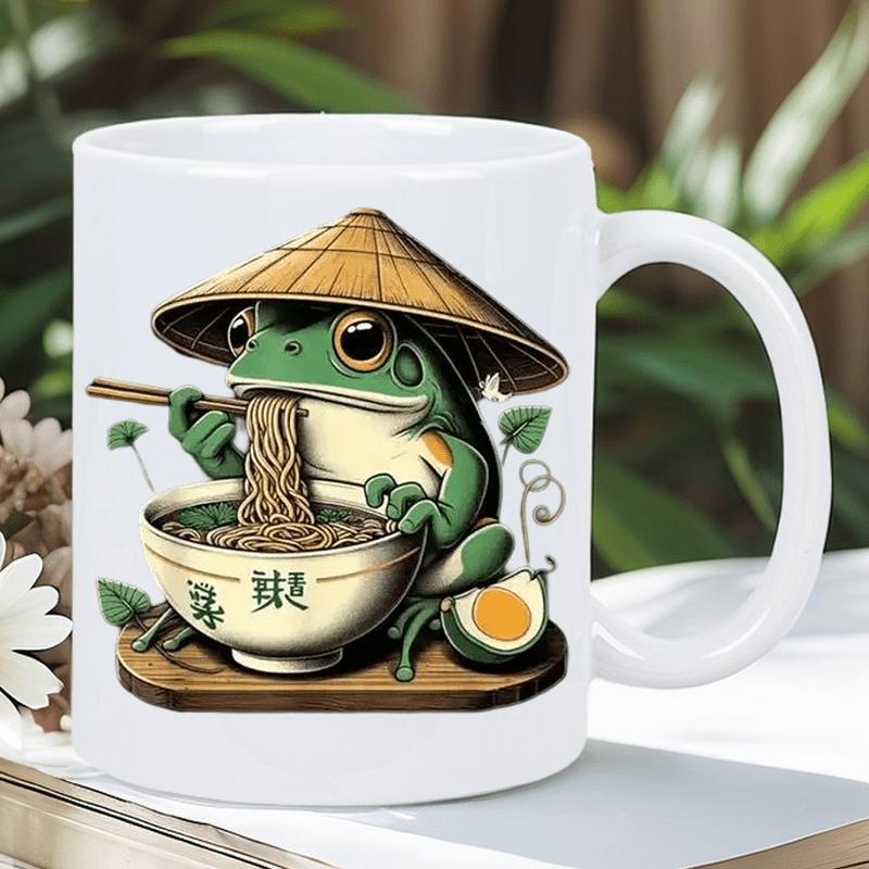 Tailorly White Ceramic 11 oz Mug - Green Frog Wearing Traditional Conical Hat Eating A Bowl Of Ramen Frog