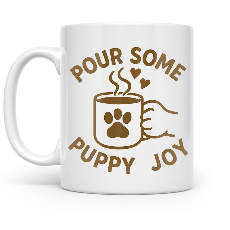 Tailorly White Ceramic 11 oz Mug - Pour Some Puppy Joy Adorable Paw Print Graphic Held By Hand With Hearts Mug
