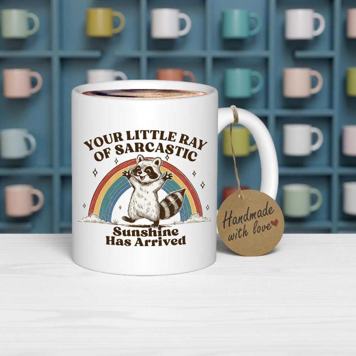 Tailorly White Ceramic 11 oz Mug - Your Little Ray Of Sarcastic Sunshine Has Arrived Cheerful Standing Under A Vibrant Colorful Rainbow With Sparkles Raccoon
