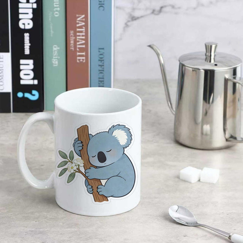 Tailorly White Ceramic 11 oz Mug - Adorable Sleeping Blue Graphic Hugging A Tree Branch With Green Leaves Koala