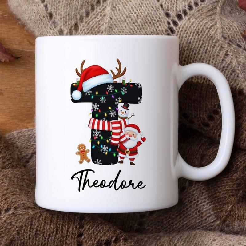 Tailorly White Ceramic 11 oz Mug - Theodore Festive Letter With Santa And Snowman Celebrating Holiday Joy Alphabet