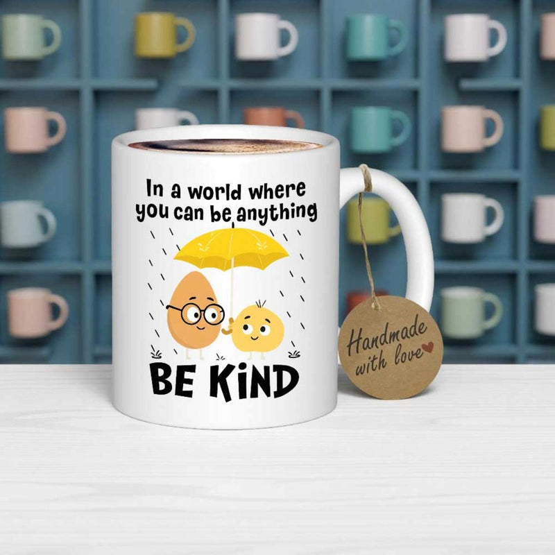 Tailorly White Ceramic 11 oz Mug - In A World Where You Can Be Anything BE KIND Cute Animated Figures Sharing A Yellow Umbrella During Rainfall Characters