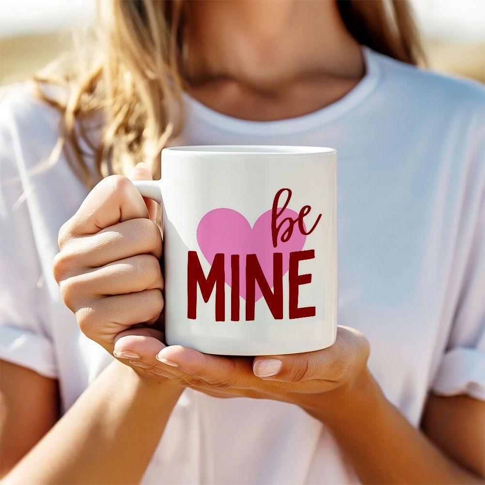 Tailorly White Ceramic 11 oz Mug - Be Mine Vibrant Pink Graphic Combined With Script And Block Style Lettering Heart
