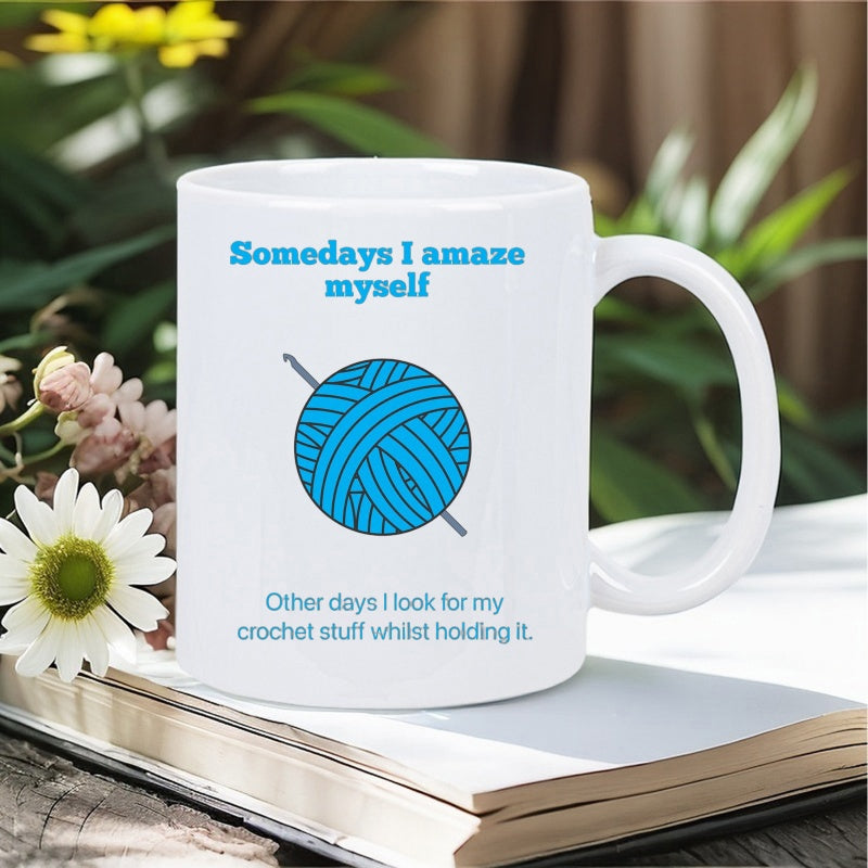 Tailorly White Ceramic 11 oz Mug - Somedays I Amaze Myself Other Days I Look For My Crochet Stuff Whilst Holding It Blue Skein Of Yarn With A Crochet Hook Passing