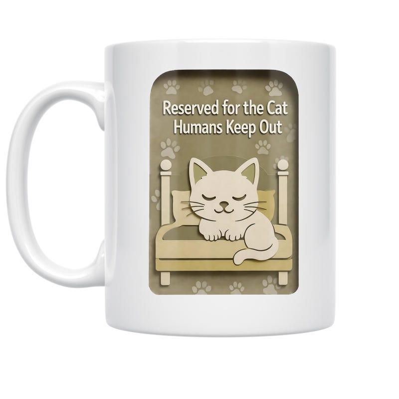 Tailorly White Ceramic 11 oz Mug - Reserved For The Cat Humans Keep Out Sleeping Cream Colored Cartoon Kitten Resting Comfortably On A Bed Cat