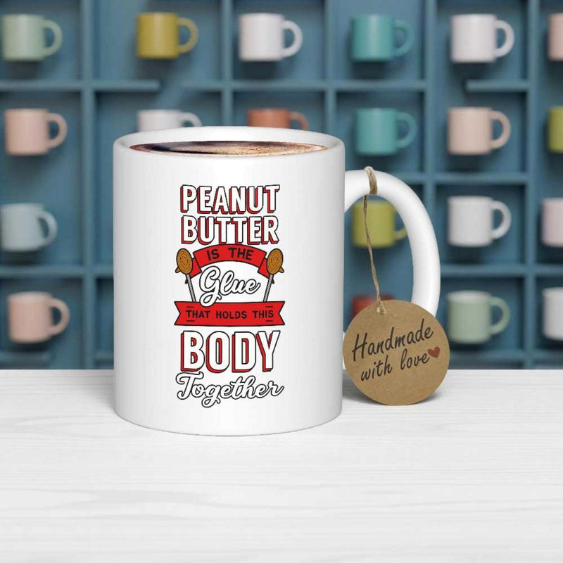 Tailorly White Ceramic 11 oz Mug - Peanut Butter Is The Glue That Holds This Body Together Artistic Typography Featuring Vibrant Banners And Tiny Hand Drawn Peanut