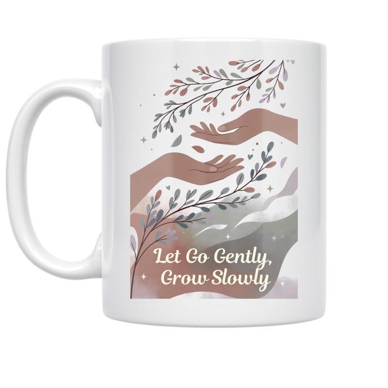 Tailorly White Ceramic 11 oz Mug - Let Go Gently Grow Slowly Muted Earthy Tones Featuring Artistic Hands Reaching Toward Delicate Botanical Leaf Branches Mug