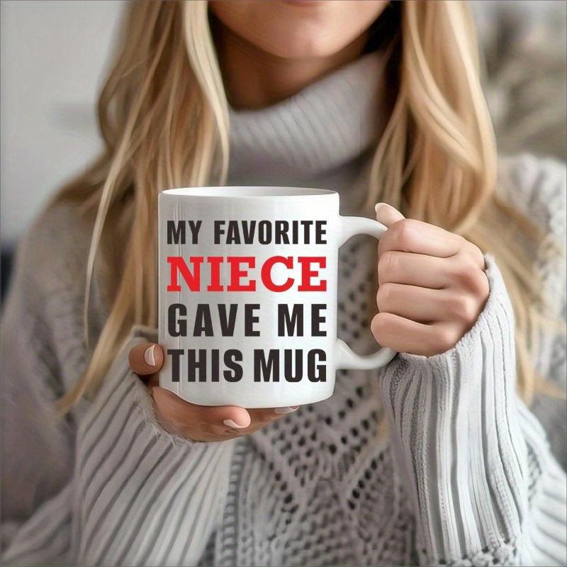 Tailorly White Ceramic 11 oz Mug - My Favorite Niece Gave Me This Mug White Ceramic With Bold Typographic Lettering Held In Cozy Warm Hands Mug
