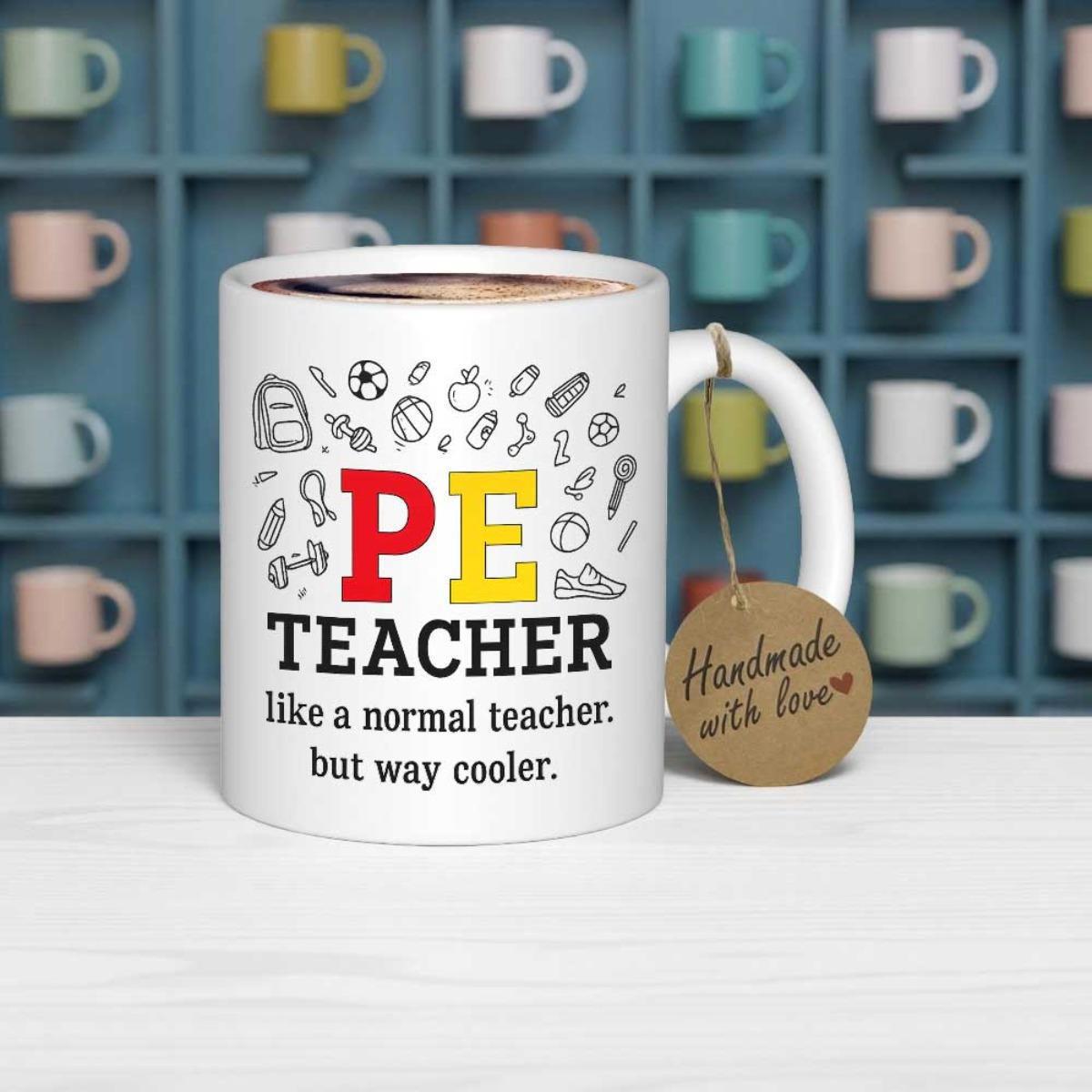 Tailorly White Ceramic 11 oz Mug - PE Teacher Like A Normal Teacher But Way Cooler Hand Drawn Sports Equipment Icons Scattered Above Colorful Bold Block Letters