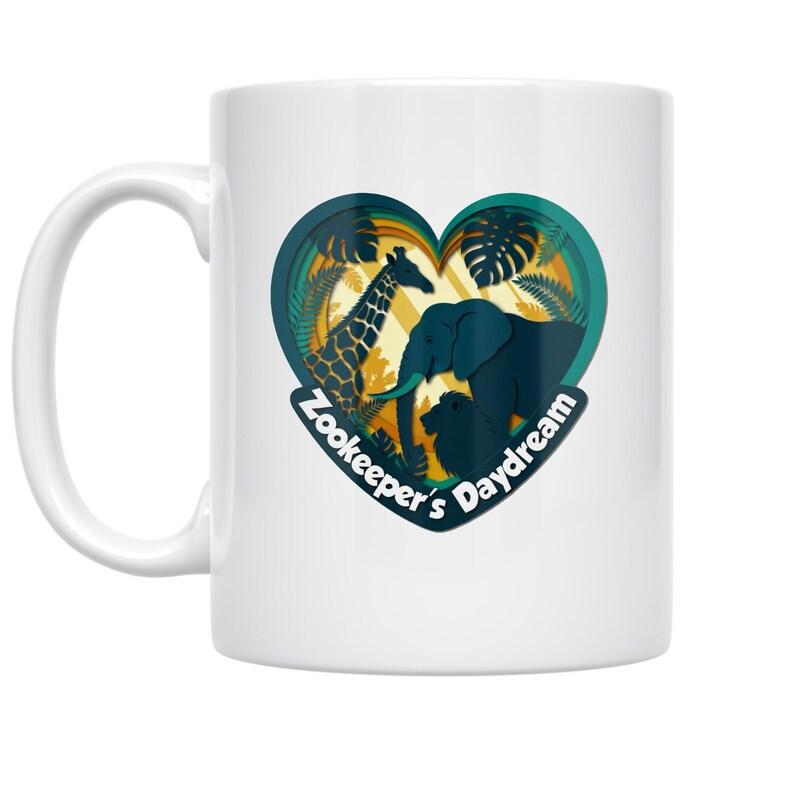 Tailorly White Ceramic 11 oz Mug - Zookeeper's Daydream Artistic Silhouettes Of African Wildlife Among Tropical Leaves Within A Heart Shaped Scene