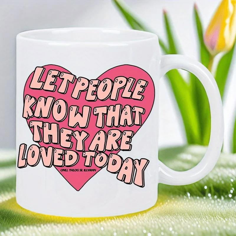 Tailorly White Ceramic 11 oz Mug - Let People Know That They Are Loved Today Bold Stylized Typography Floating Inside A Large Vibrant Pink Heart