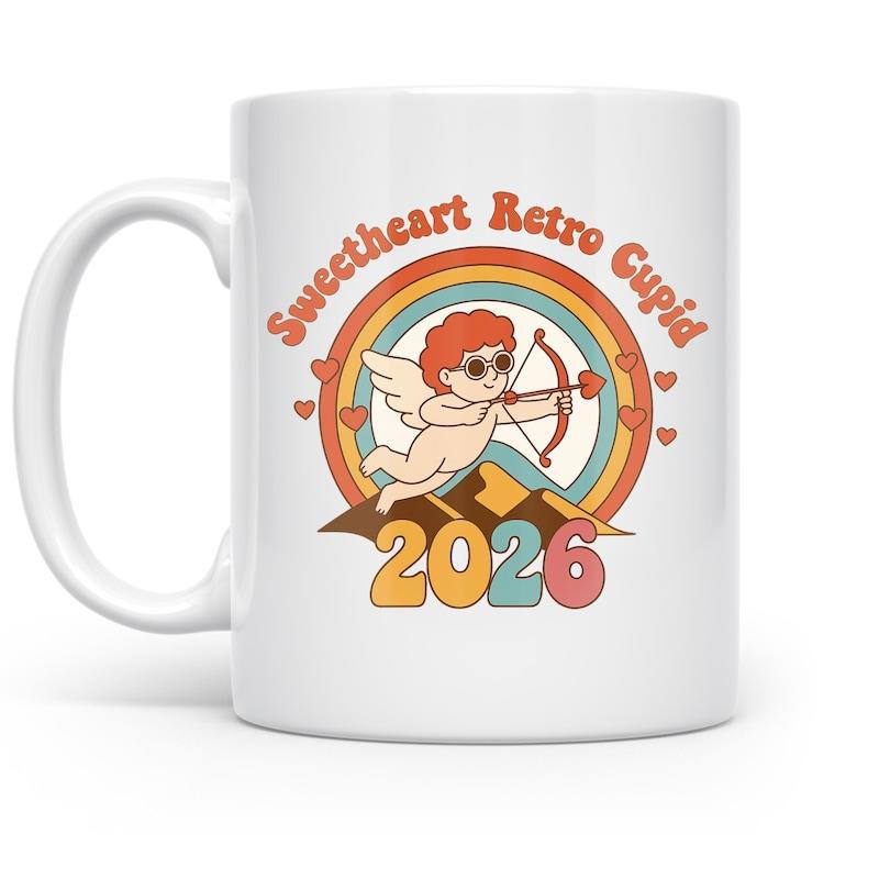 Tailorly White Ceramic 11 oz Mug - Sweetheart Retro Cupid 2026 Vintage Style Flying Angel With Bow Above Scenic Mountain Landscape Cupid