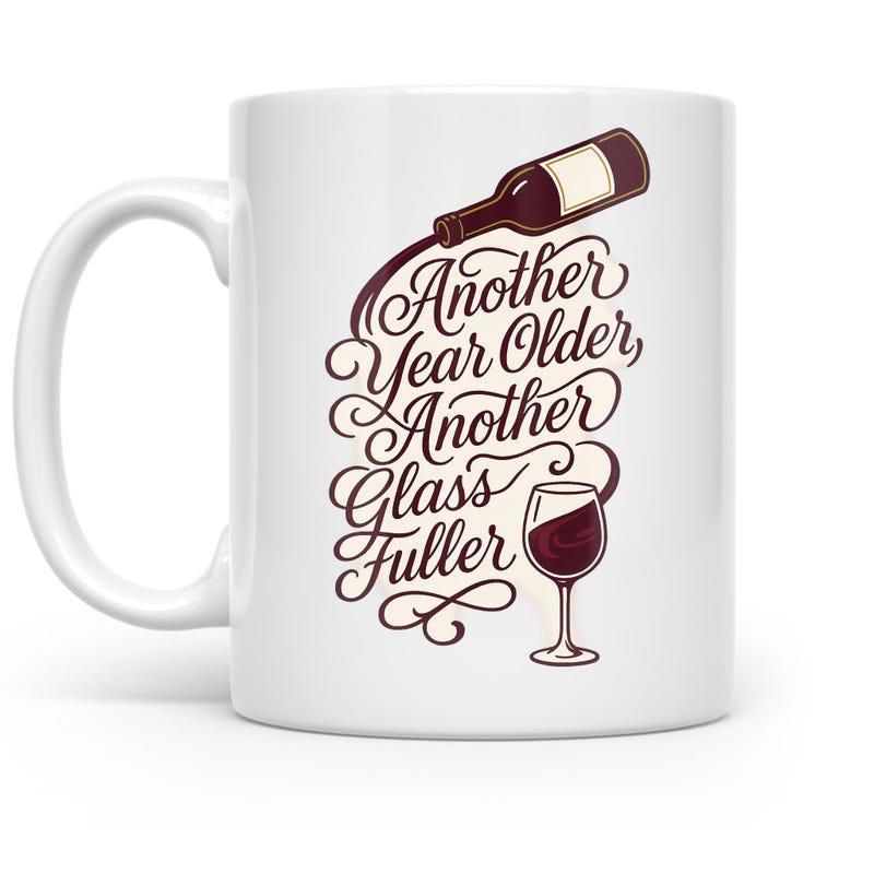 Tailorly White Ceramic 11 oz Mug - Another Year Older Another Glass Fuller Elegant Wine Bottle Pouring Into A Delicate Glass Among Decorative Swirls Mug