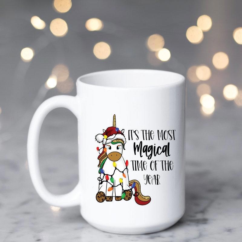 Tailorly White Ceramic 11 oz Mug - It's The Most Magical Time Of The Year Festive Cartoon Character Wrapped In Colorful Glimmering Christmas String Lights Unicorn