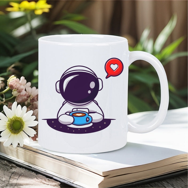 Tailorly White Ceramic 11 oz Mug - Cute Little Spaceman Sipping Warm Coffee With A Heart Bubble Astronaut