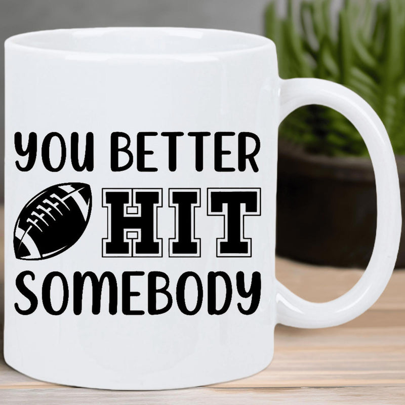Tailorly White Ceramic 11 oz Mug - You Better Hit Somebody Bold Athletic Styling With Textured Black And White Football