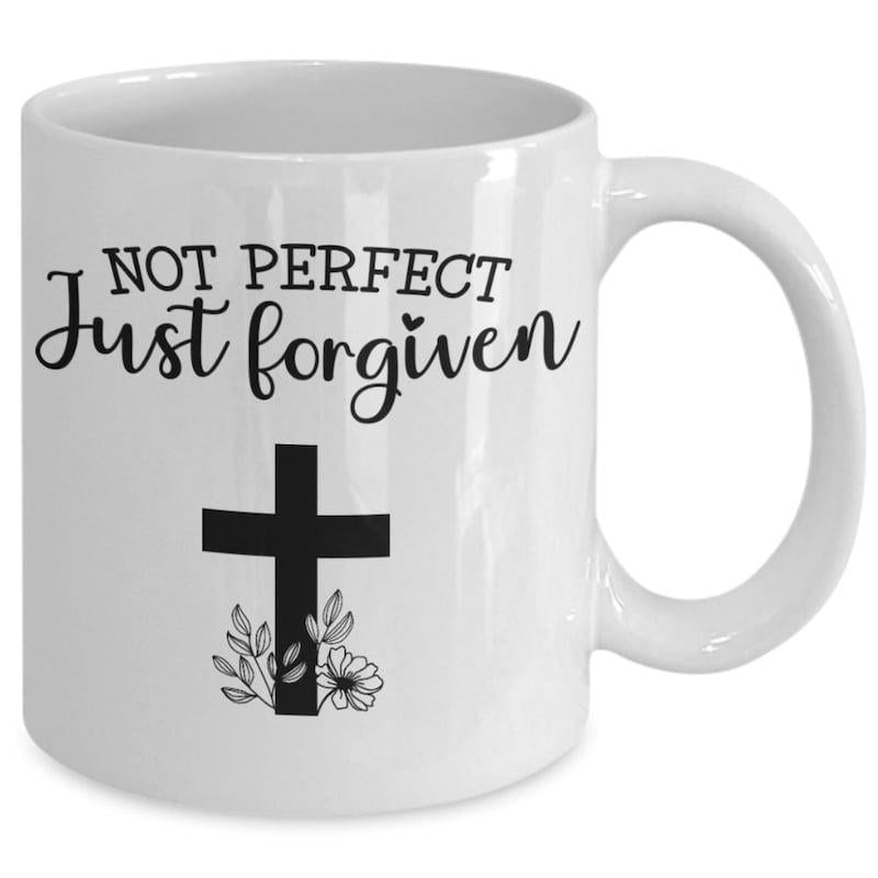 Tailorly White Ceramic 11 oz Mug - Not Perfect Just Forgiven Minimalist Black Silhouette With Delicate Floral Accents At The Base Cross