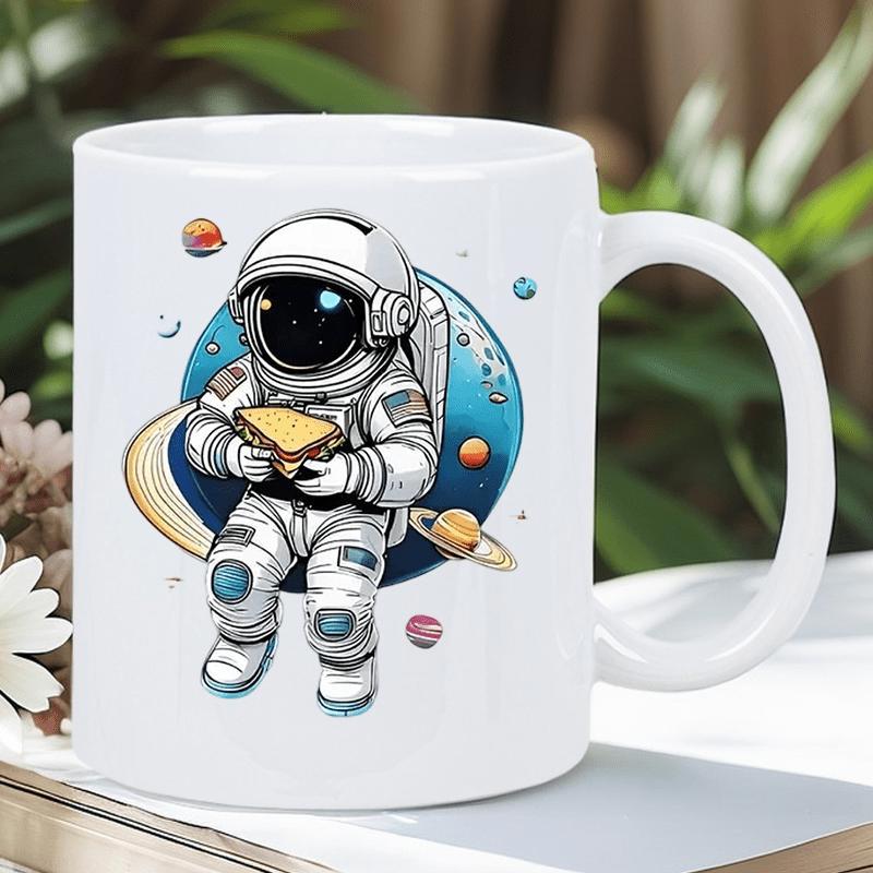 Tailorly White Ceramic 11 oz Mug - Adorable Space Traveler Eating A Sandwich Among Floating Orbits And Planets Astronaut