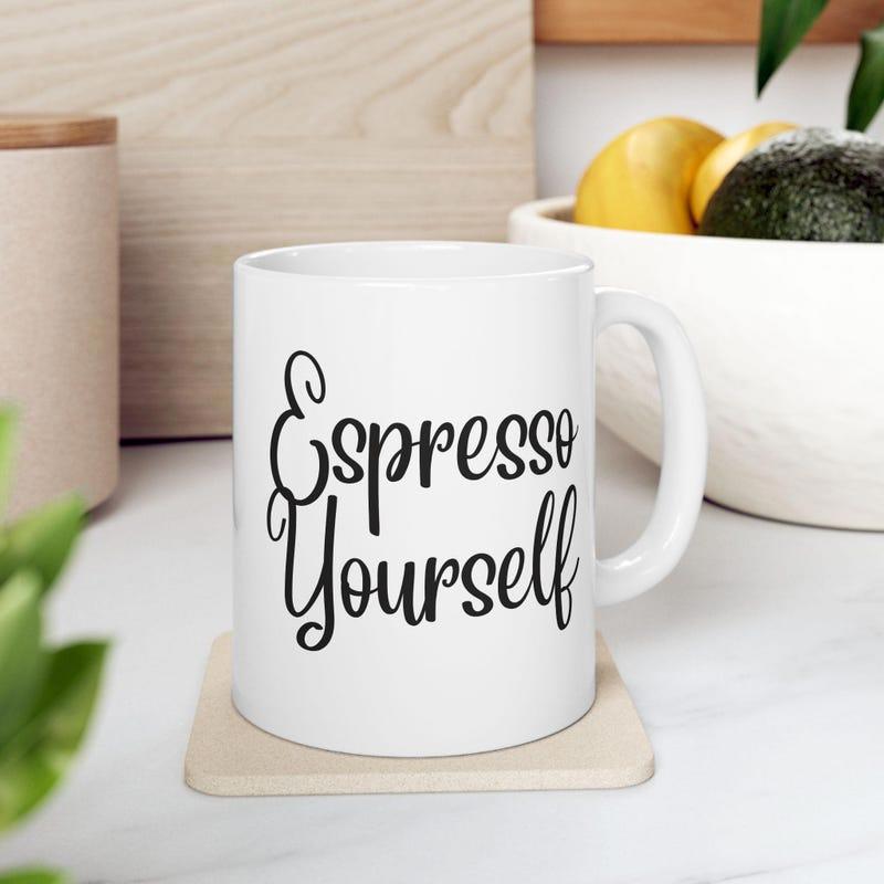 Tailorly White Ceramic 11 oz Mug - Espresso Yourself Classic White Ceramic Morning Coffee Vessel Resting Upon A Square Coaster Mug