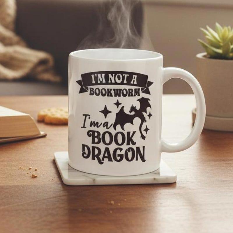 Tailorly White Ceramic 11 oz Mug - Im Not A Bookworm Im A Book Dragon Silhouette Of Flying Mythical Creature Among Twinkling Stars Dragon