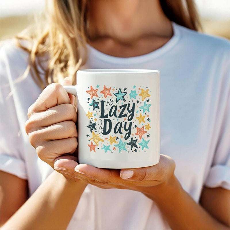 Tailorly White Ceramic 11 oz Mug - Lazy Day Whimsical Colorful Stars Floating Around Handwritten Bold Script Under Morning Light Star