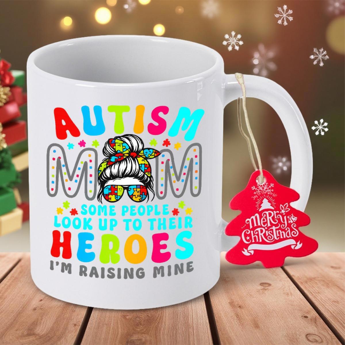 Tailorly White Ceramic 11 oz Mug - Autism Mom Some People Look Up To Their Heroes I'm Raising Mine Vibrant Colorful Puzzle Pattern Messy Bun Woman Wearing Stylish