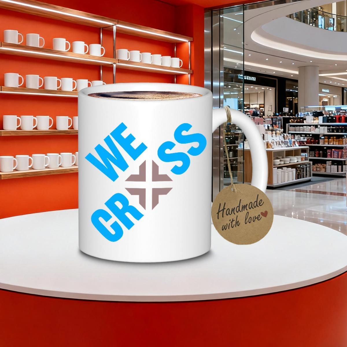 Tailorly White Ceramic 11 oz Mug - We Cross Bold Blue Typography Centered Around A Minimalist Brown Geometric Plus Symbol Mug