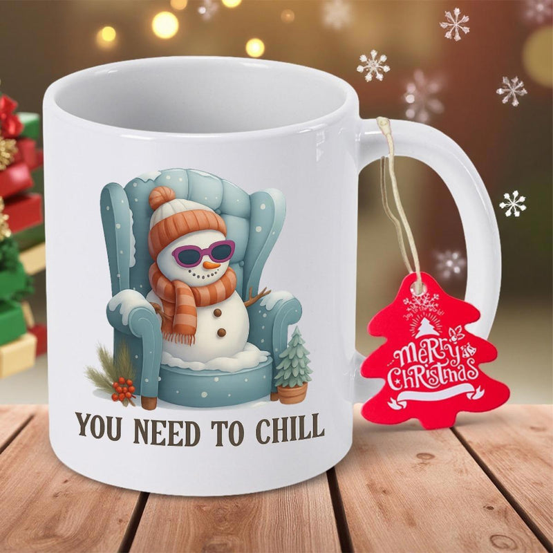 Tailorly White Ceramic 11 oz Mug - You Need To Chill Relaxing Winter Figure Wearing Stylish Sunglasses Sitting Inside A Blue Armchair Snowman