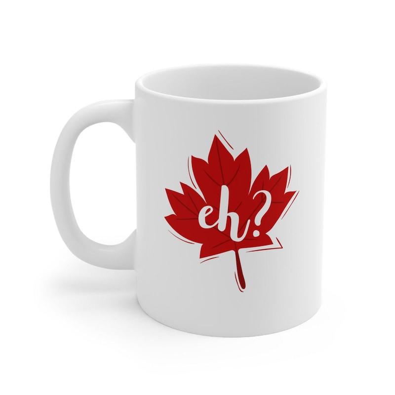 Tailorly White Ceramic 11 oz Mug - Eh Bold Red Canadian Forest Element Floating With White Decorative Lines Leaf