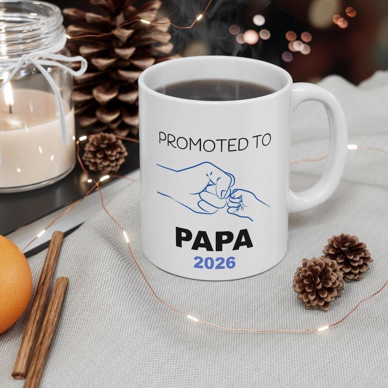Tailorly White Ceramic 11 oz Mug - Promoted To Papa 2026 Minimalist Line Art Showing Gentle Bond Between Father And Child Fist Bump