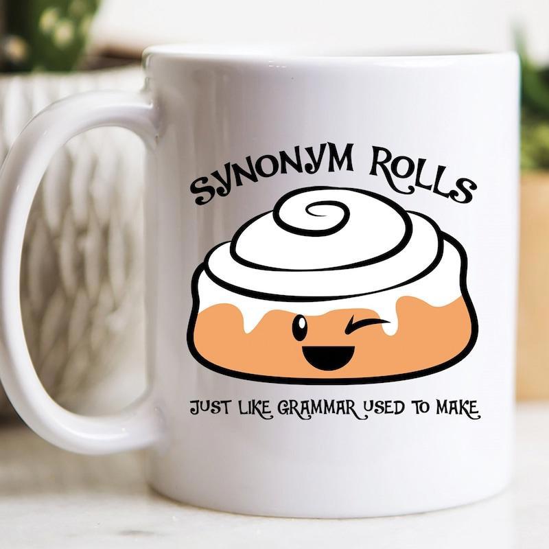Tailorly White Ceramic 11 oz Mug - Synonym Rolls Just Like Grammar Used To Make Cute Cartoon Pastry With A Winking Smiling Face And White Icing Cinnamon Roll