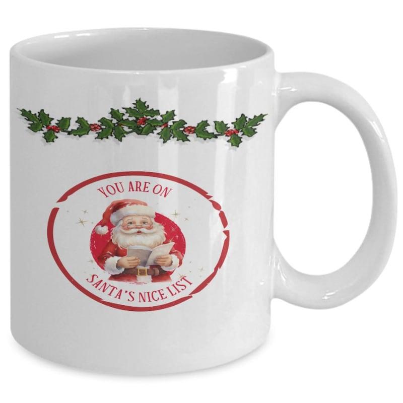 Tailorly White Ceramic 11 oz Mug - You Are On Santas Nice List Festive Red Oval Badge With Holly Leaves And Smiling Traditional Santa