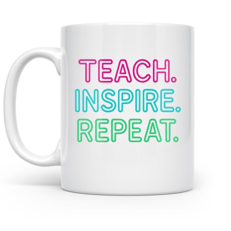 Tailorly White Ceramic 11 oz Mug - Teach Inspire Repeat Vibrant Three Colored Text Displayed On Smooth Mug