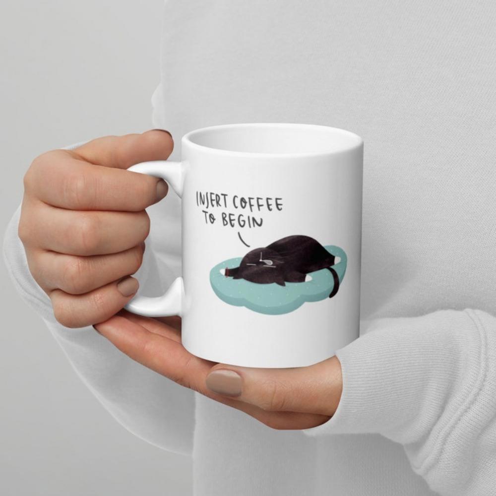 Tailorly White Ceramic 11 oz Mug - Insert Coffee To Begin Lazy Black Cat Lying Comfortably On A Light Blue Cloud Like Surface Cat